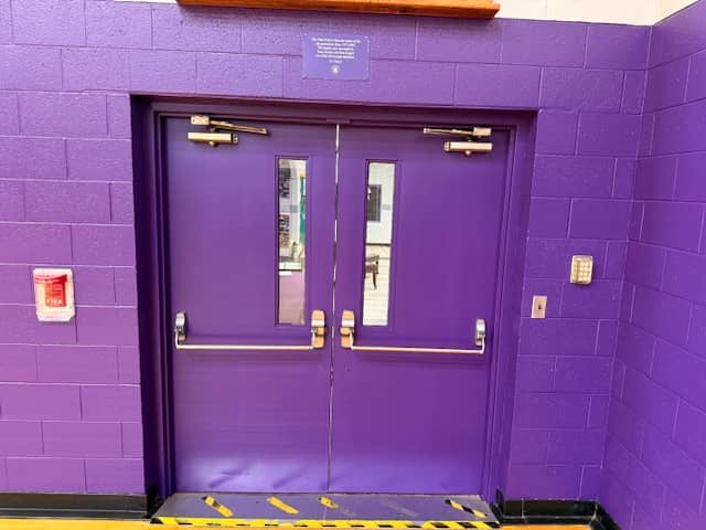 school gym doors purple paint
